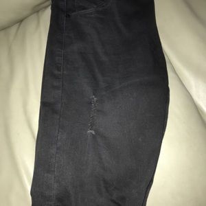 Black skinny rip jeans